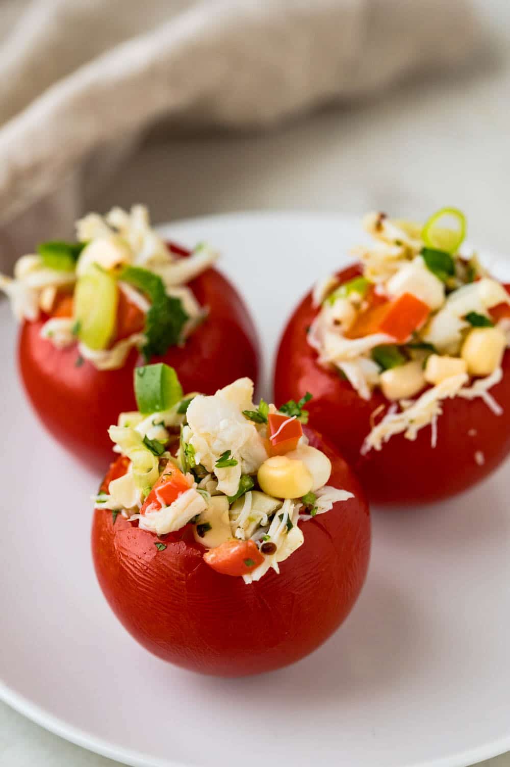 stuffing campari tomatoes with the crabmeat salad recipe.