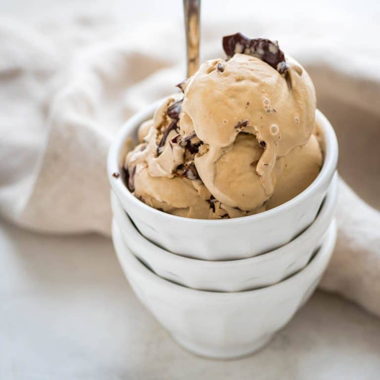coffee Kahlúa ice cream in a bowl with a spoon.
