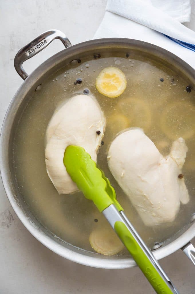 poaching chicken in a court bouillon.