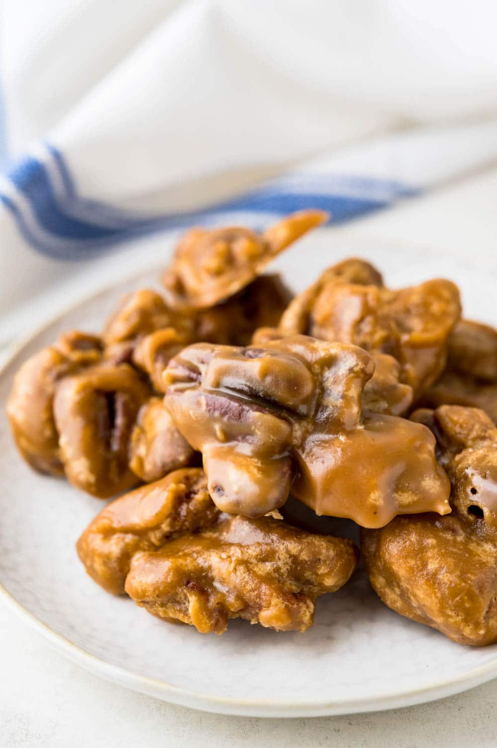 pecan pralines on a plate.