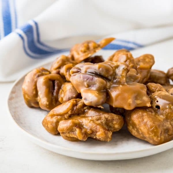pecan praline candy on a plate.