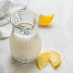 lemon poppyseed dressing in a pitcher.