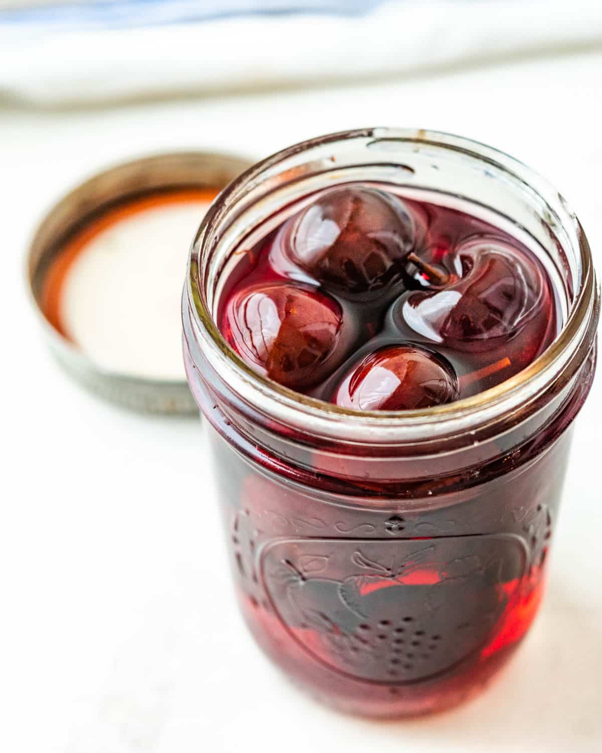 a jar of drunken cherries.