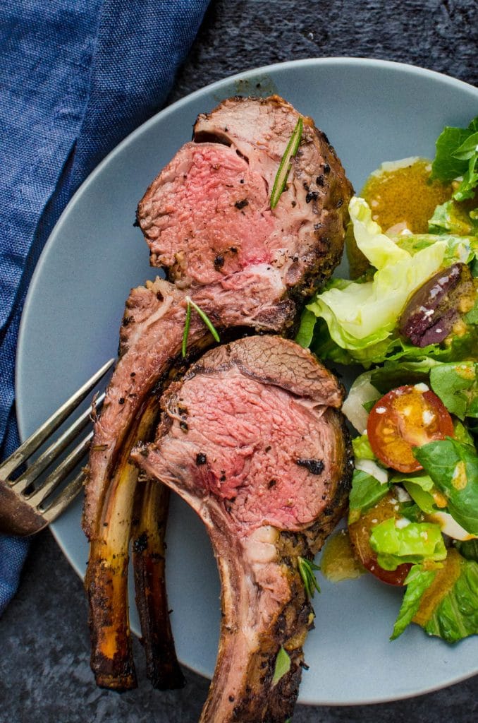Herb-crusted rack of lamb, cut into double-cut chops.