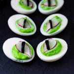 Halloween eggs on a dark platter.