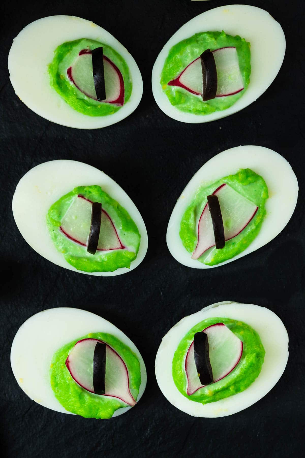 flavored deviled eggs decorated for halloween.