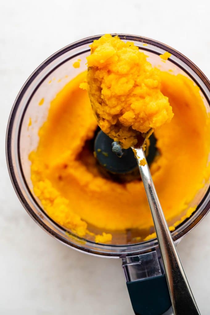 pureeing the squash in a food processor. 
