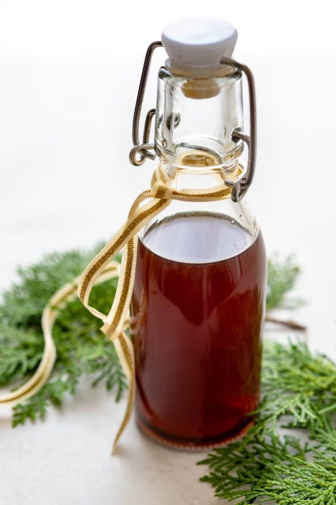 a bottle of pumpkin spice syrup for the holiday old fashioned cocktail.