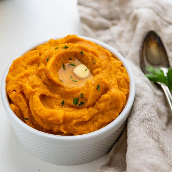 Simple Mashed Sweet Potatoes with a pat of butter.