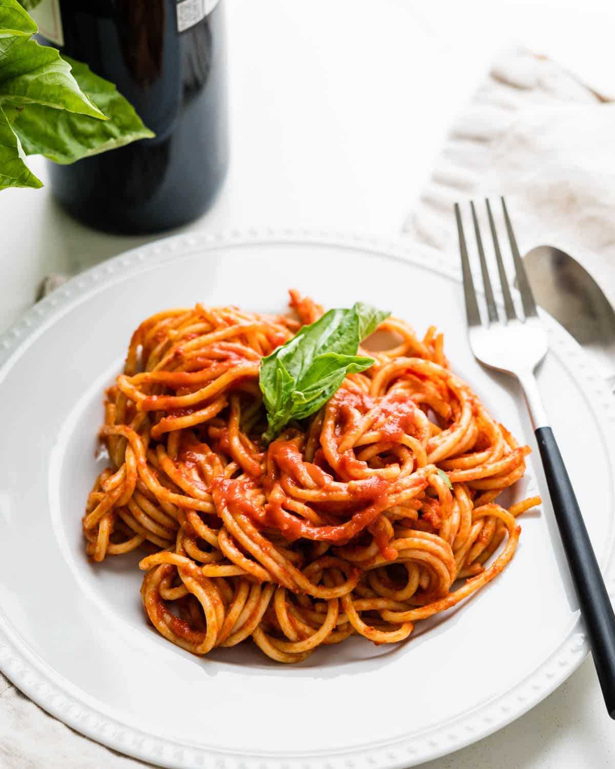 Homemade Pomodoro sauce over spaghetti noodles.