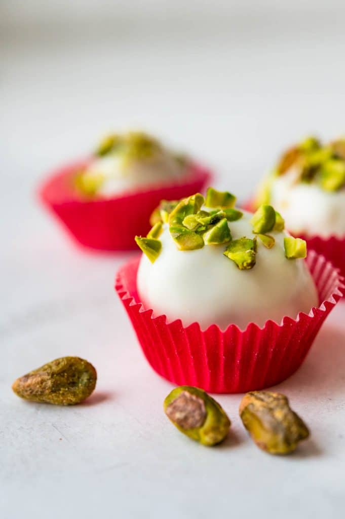 gifting pistachio truffles in a festive candy wrapper.