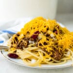 5 way chili and spaghetti piled on a plate