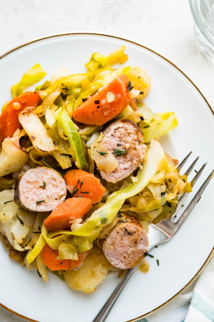A serving of the sausage skillet dinner on a plate. 