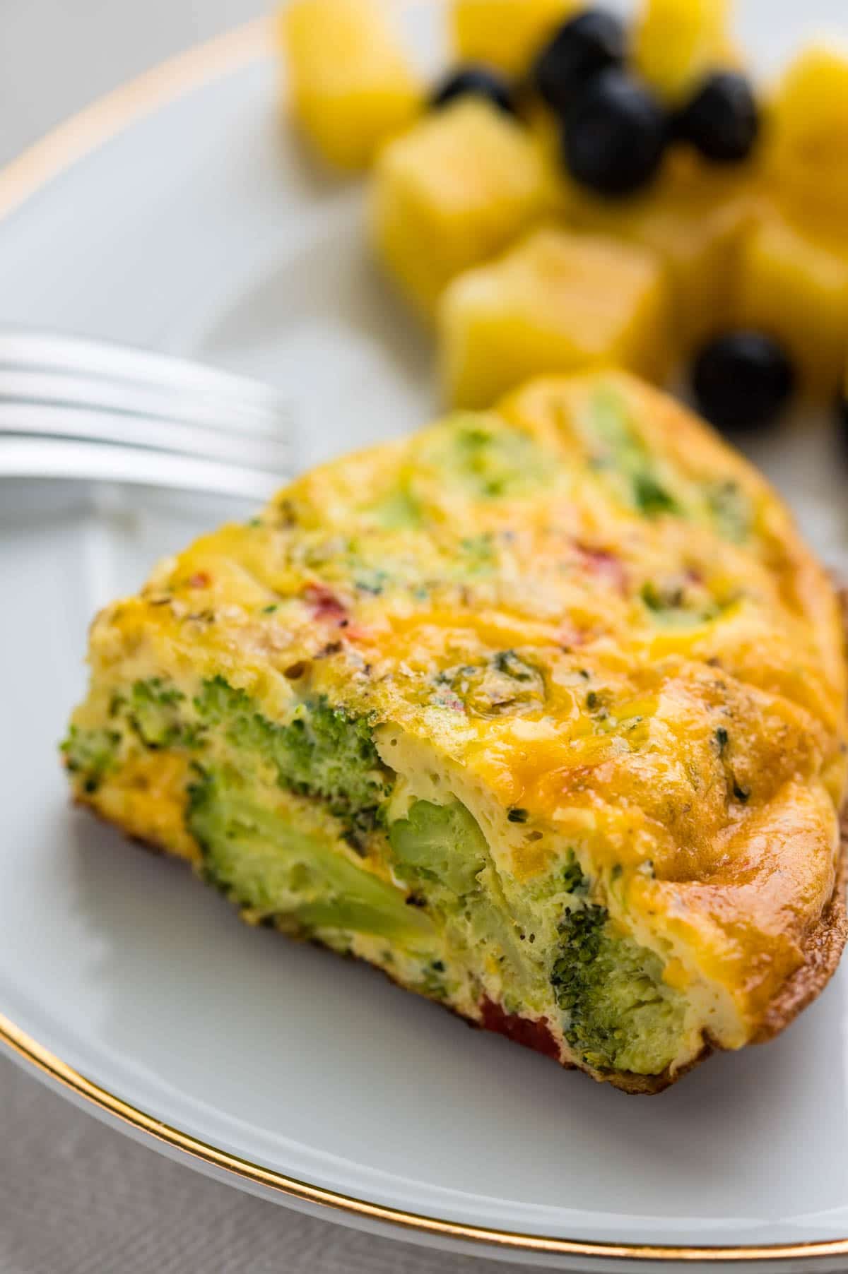 broccoli frittata for breakfast with a fruit salad.