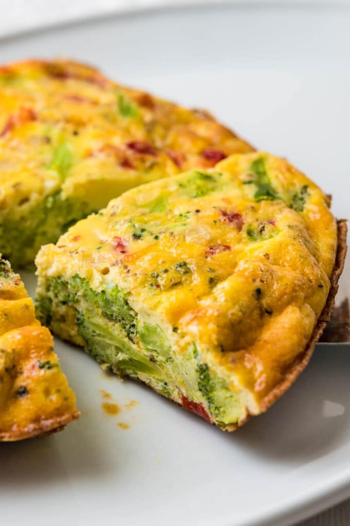 Cut the veggie frittata into wedges to serve.