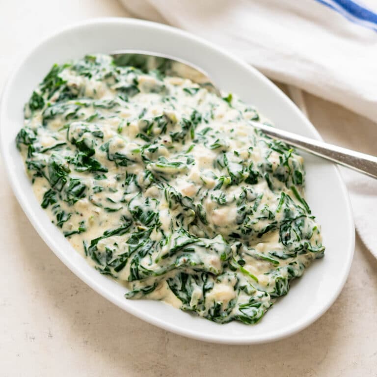 a serving dish of steakhouse creamed spinach.