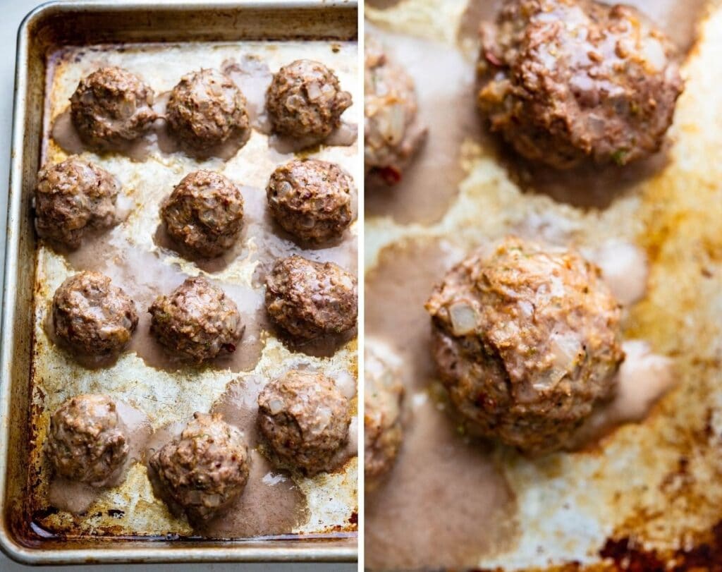 cooked lamb meatballs on a rimmed baking sheet.
