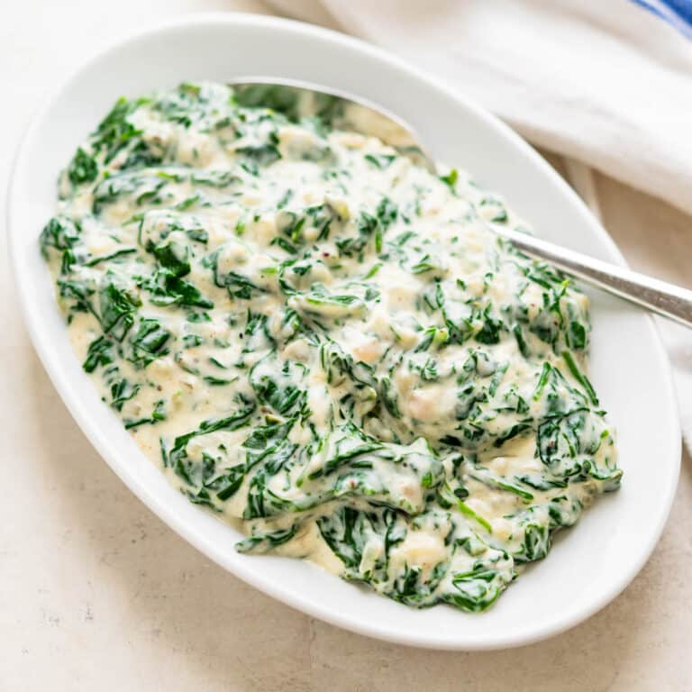 Serving creamed spinach for a side dish.