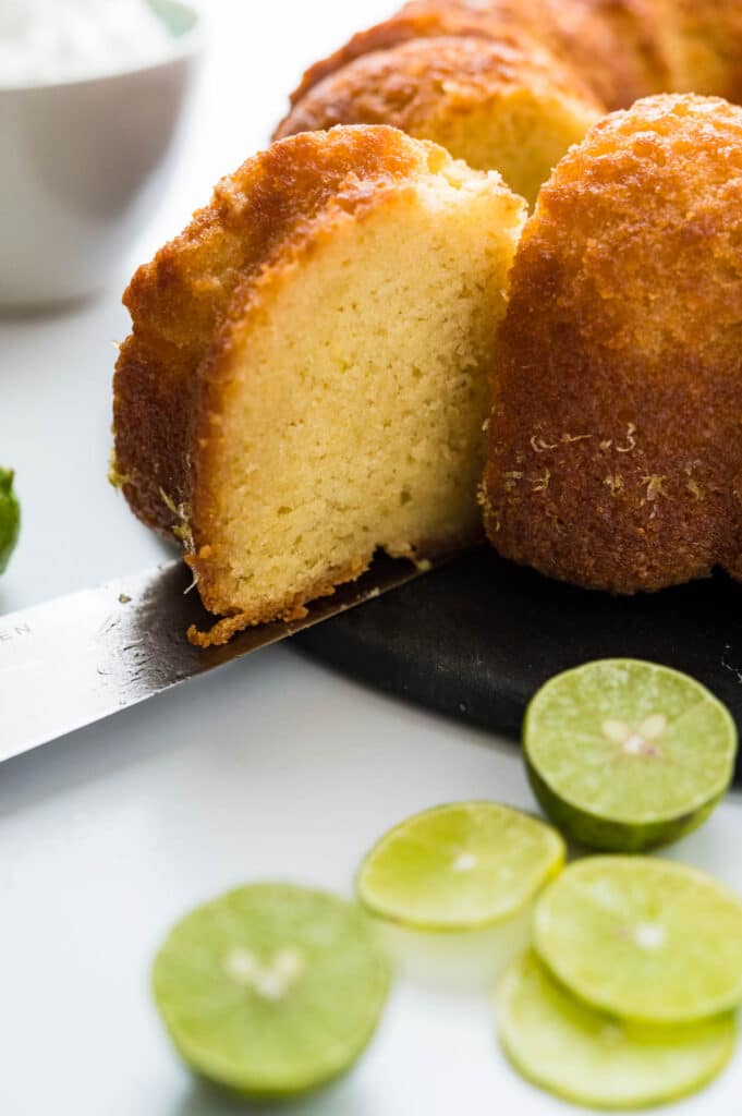 Taking a slice of key lime cake.