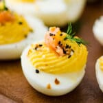 smoked salmon deviled eggs on a platter.