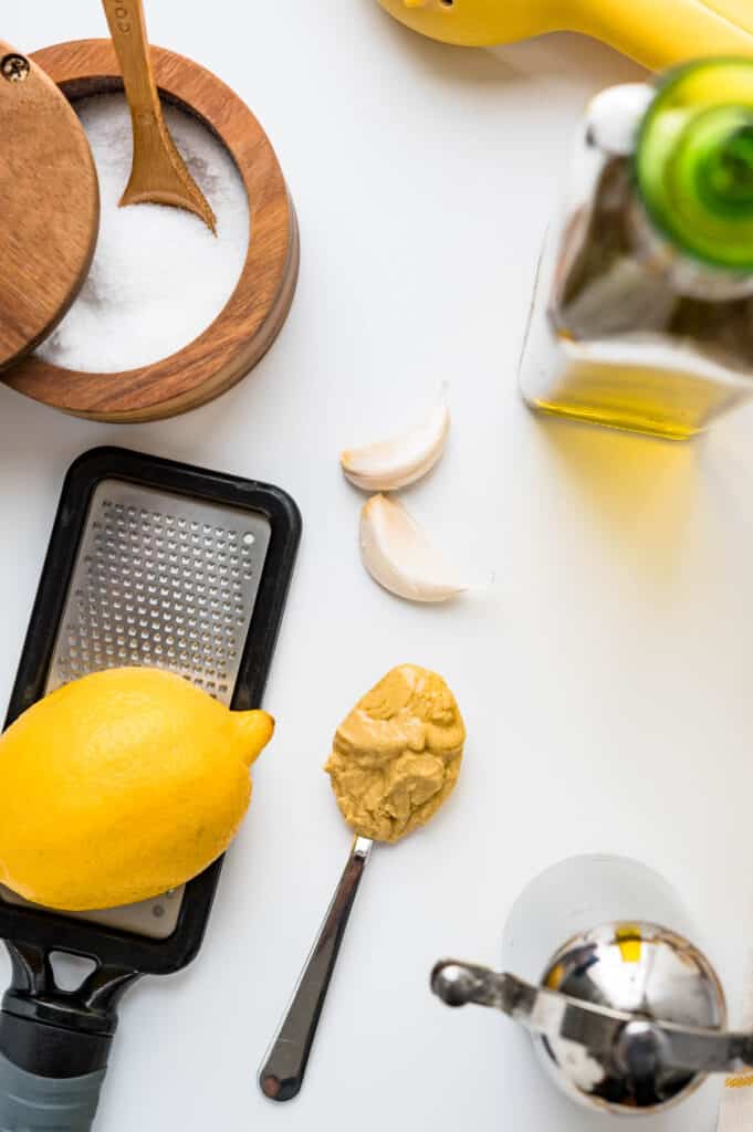 the ingredients to make a homemade lemon dressing.