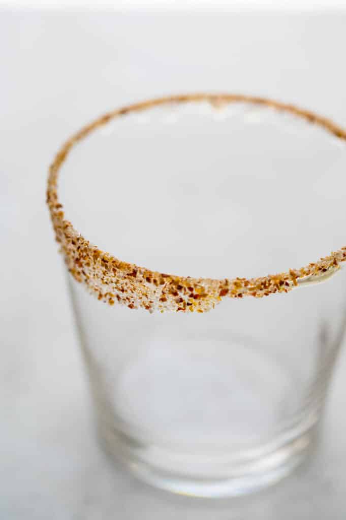 a glass with the seasoning fixed to the rim.