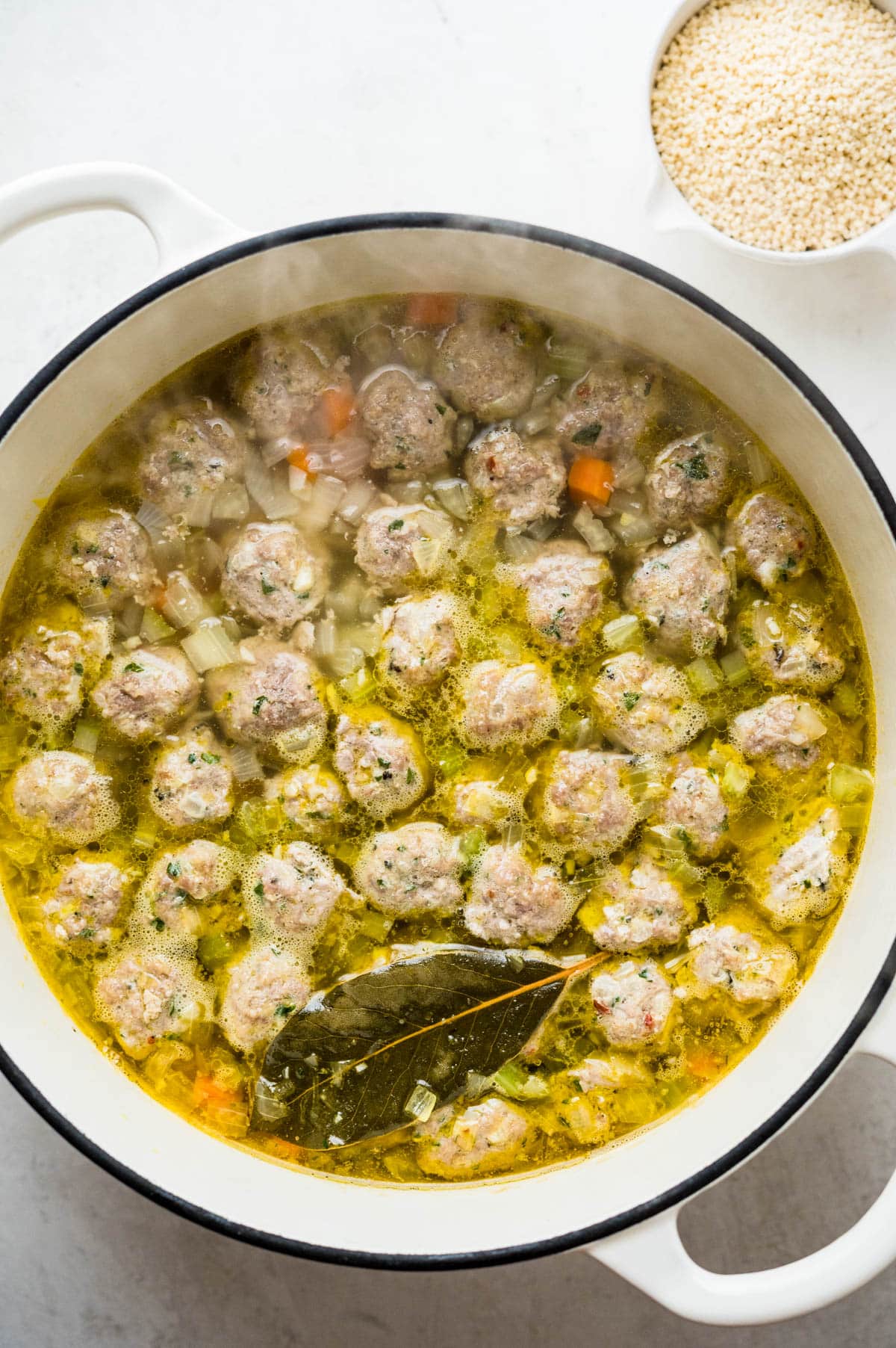 simmer the meatballs in stock. 