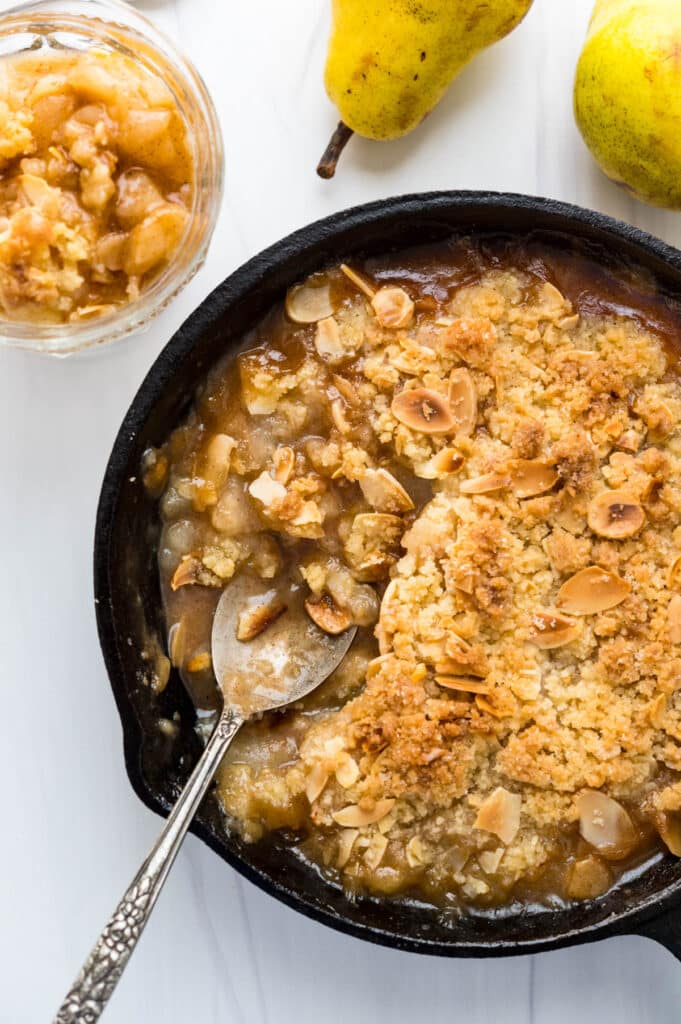 A cast iron skillet of pear crumble.