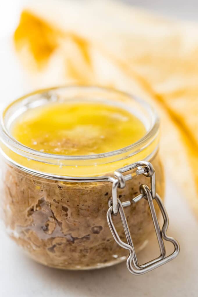 top the rillettes with melted butter to seal. 