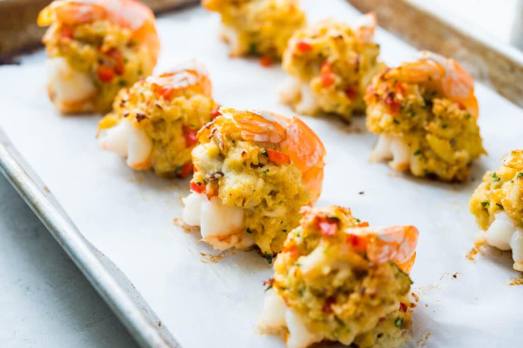 The golden-baked stuffed shrimp is hot from the oven.
