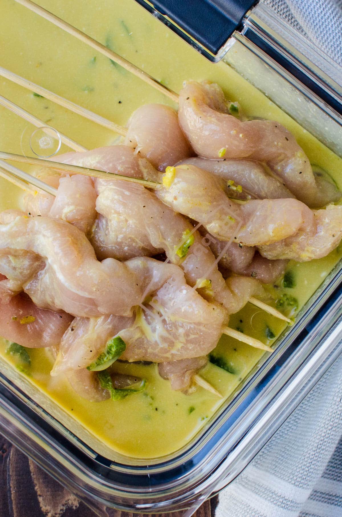 I am marinating the chicken skewers.