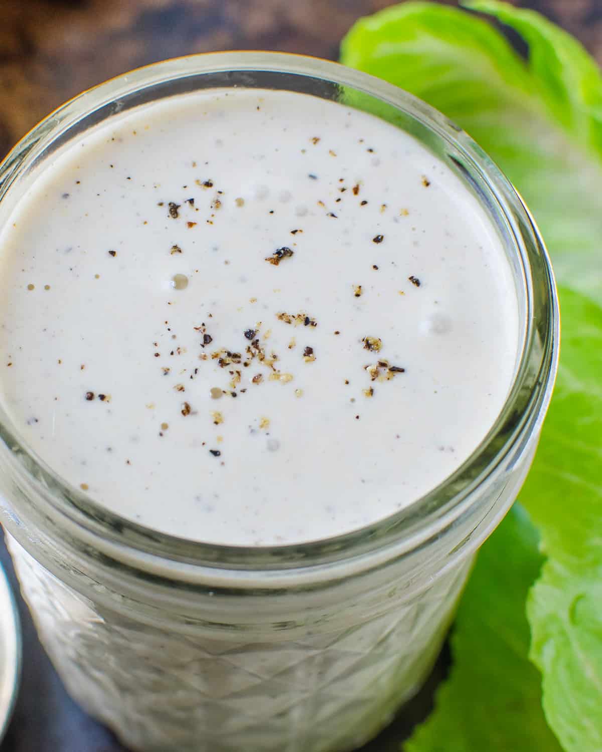 Store the parmesan peppercorn dressing in a resealable glass jar.