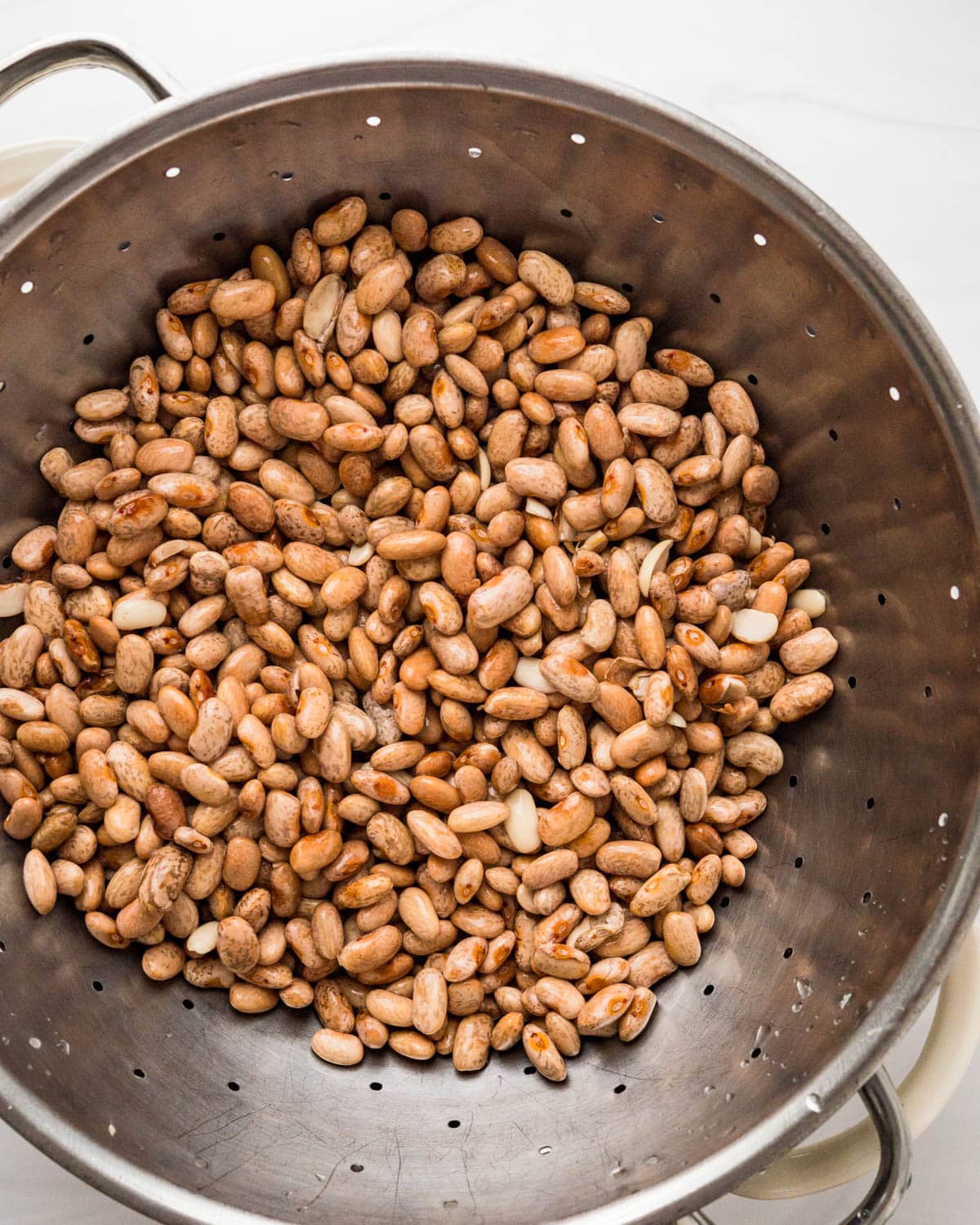 rinse and drain the soaked beans in a colander.