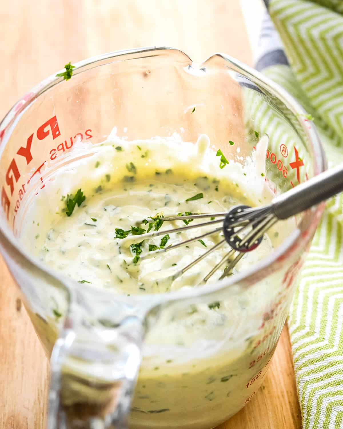 The dressing is a mayonnaise base with lots of seasonings and hot sauce.