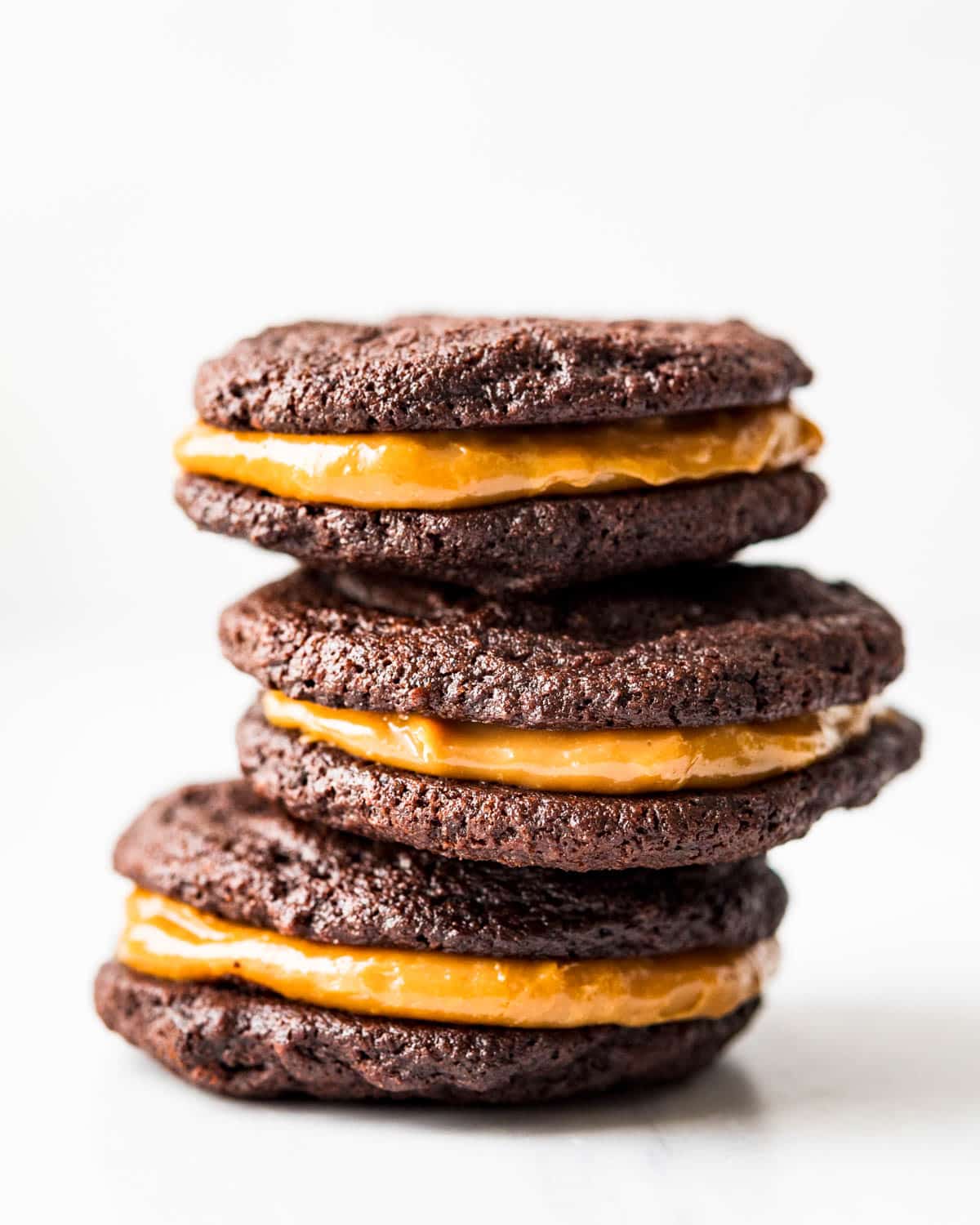 Chocolate cookies with dulce de leche sandwiched in between.