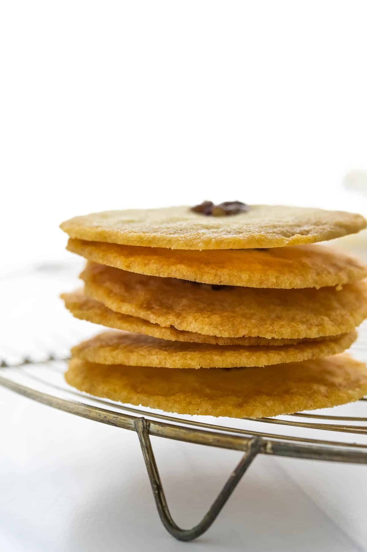 A stack of 6 crispy sugar cookies to show how thin they are.