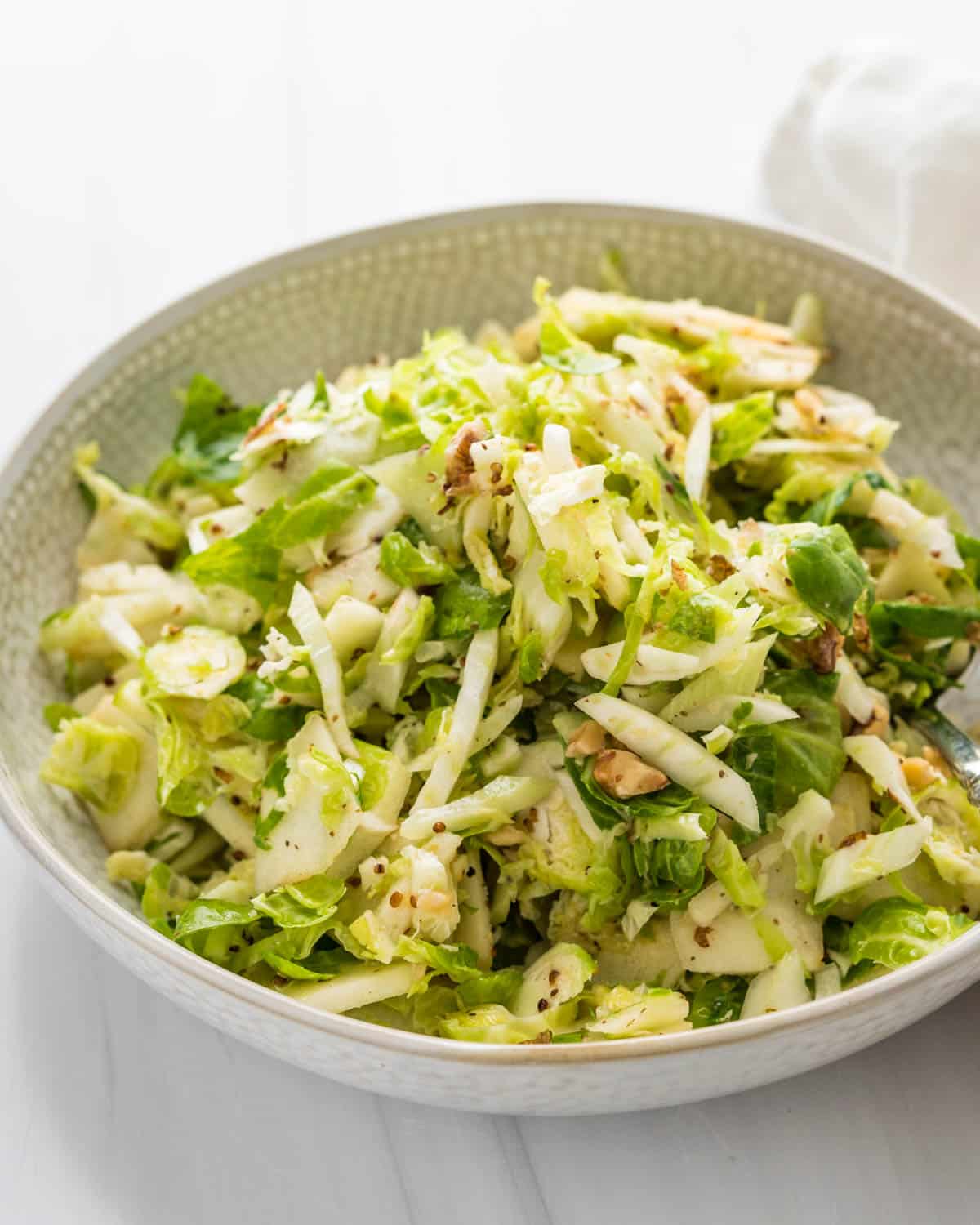 Serving the slaw with walnuts.