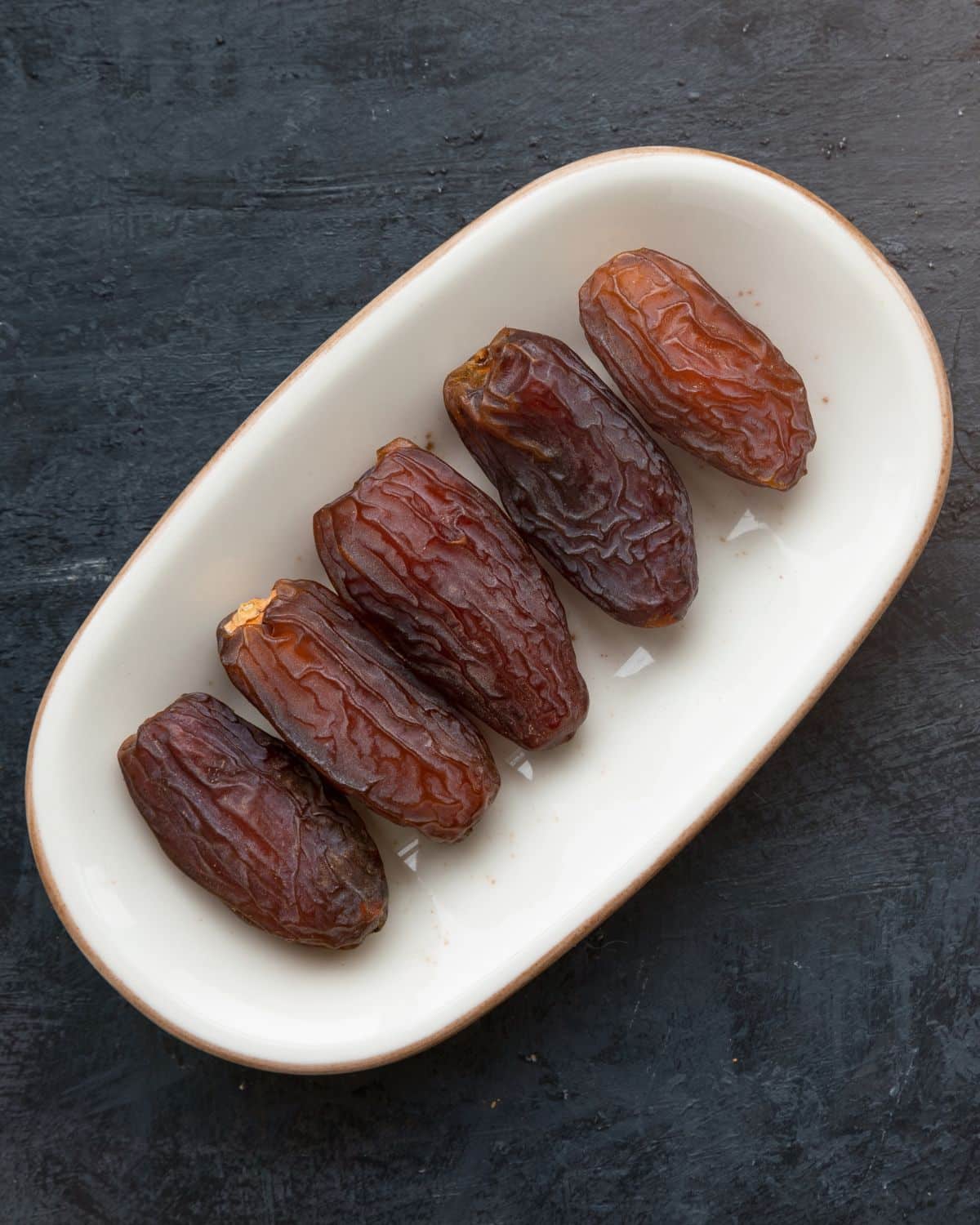 A plate of whole dates.