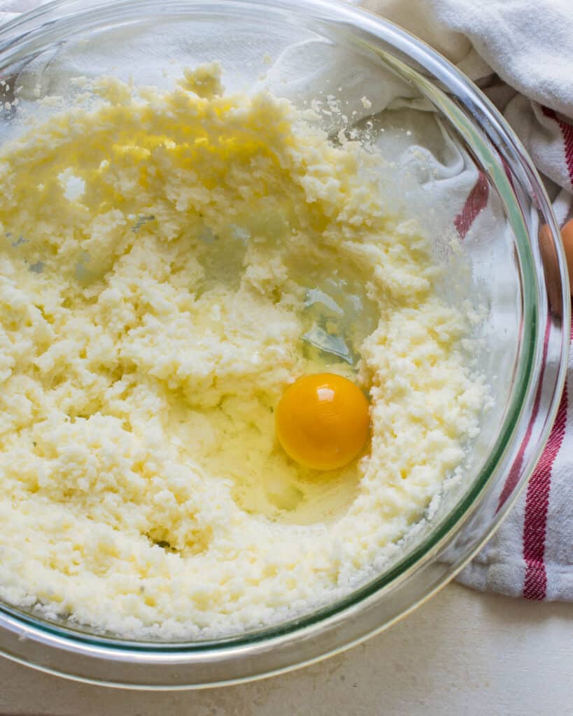 Creaming the butter, sugar and egg together. 