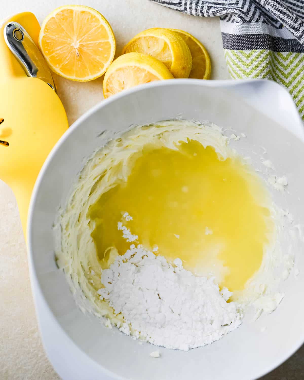 Making lemon cream cheese glaze.