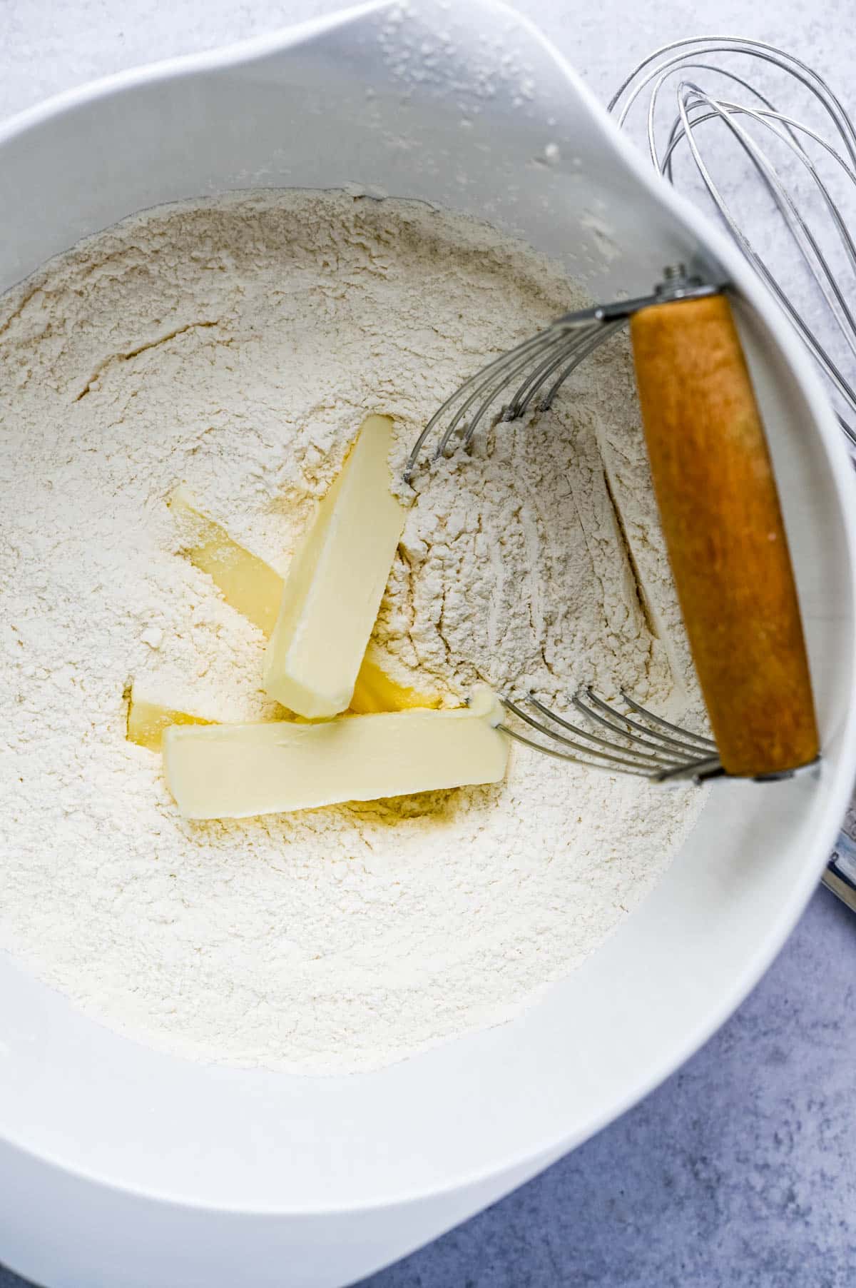 cutting butter into flour.