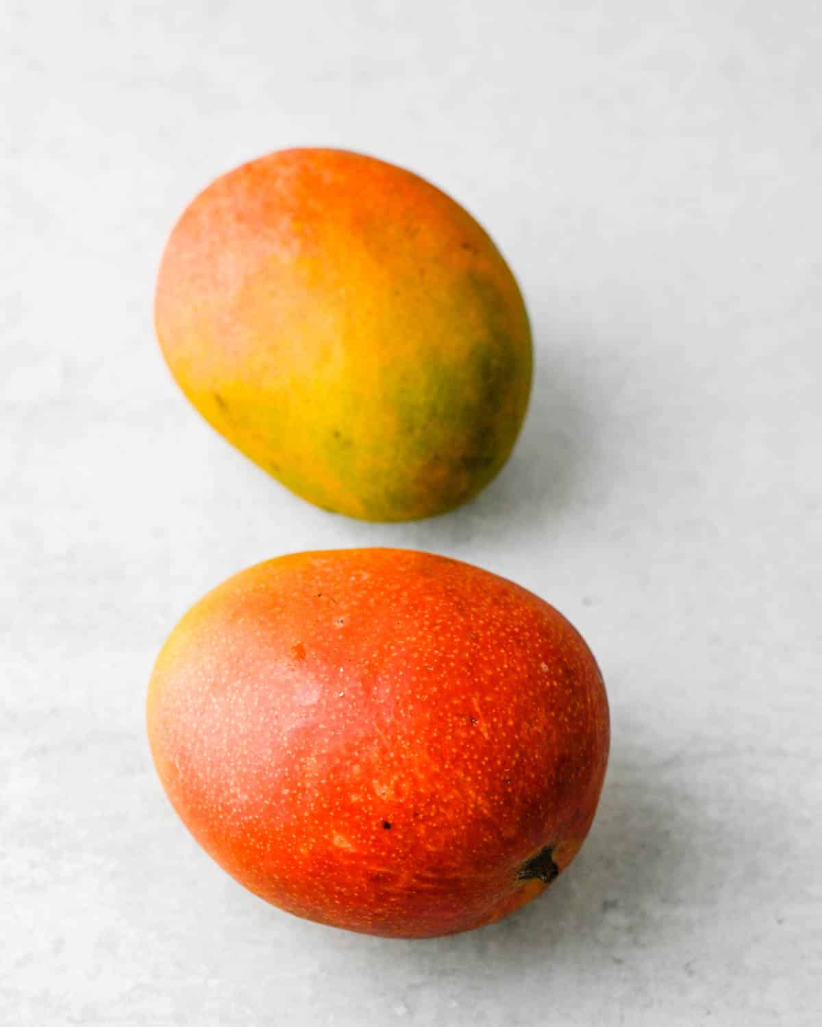 two ripe mangoes.