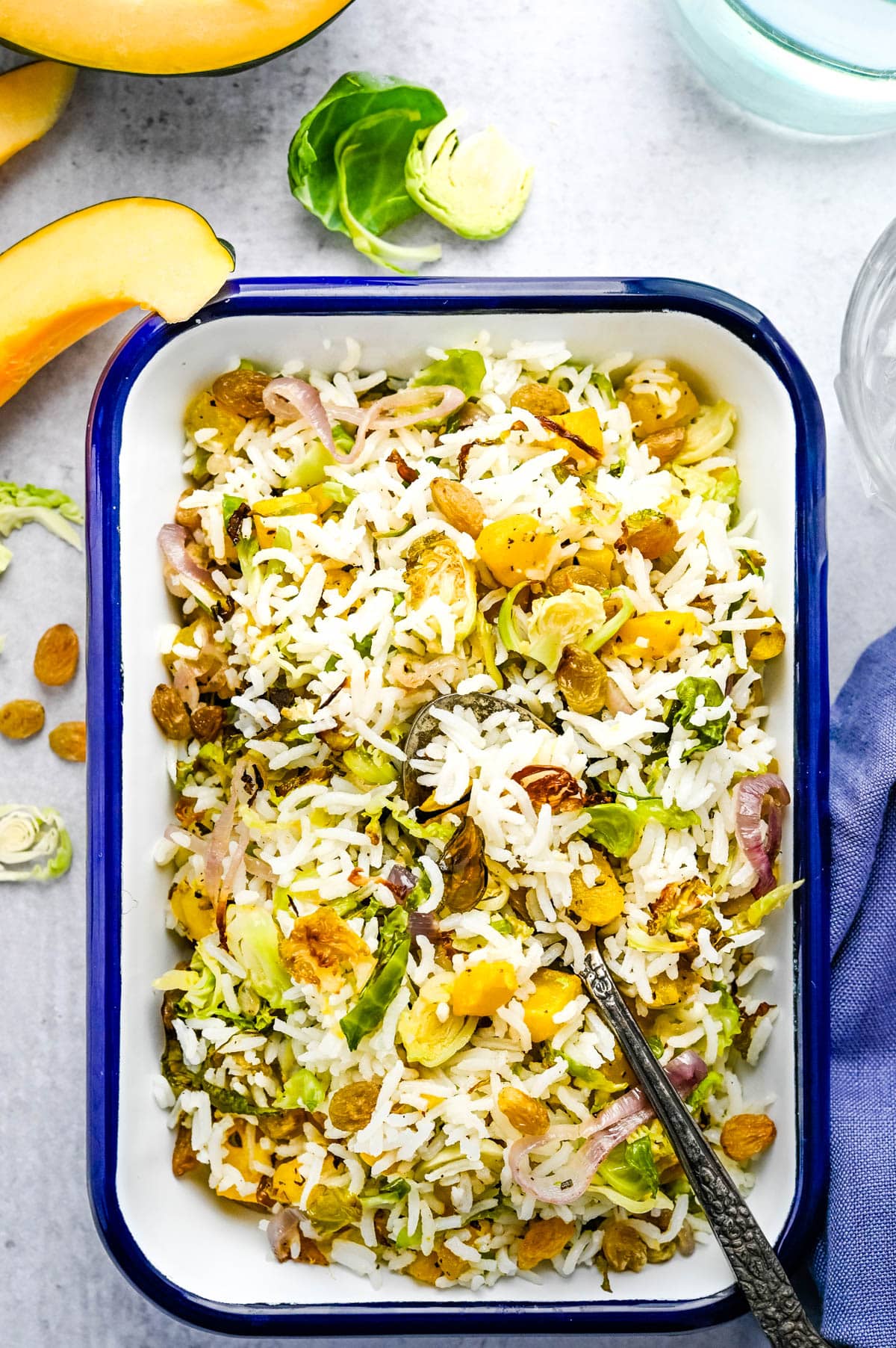 rice pilaf with golden raisins, squash and brussels sprouts.
