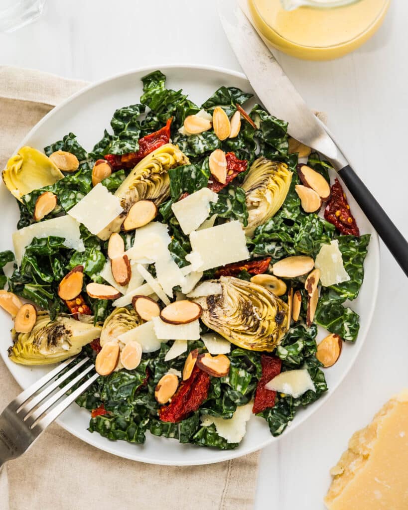 A Tuscan kale salad with shaves of parmesan cheese and lemon dressing.