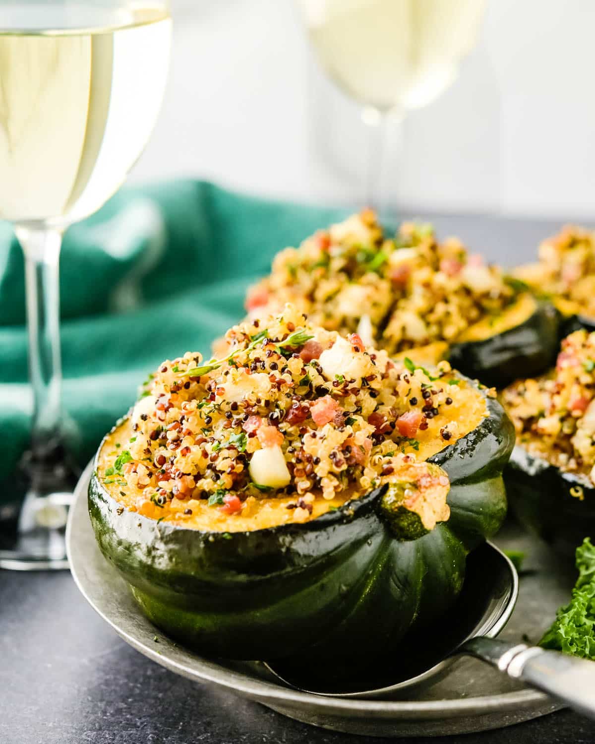 We are serving stuffed acorn squash on a platter.