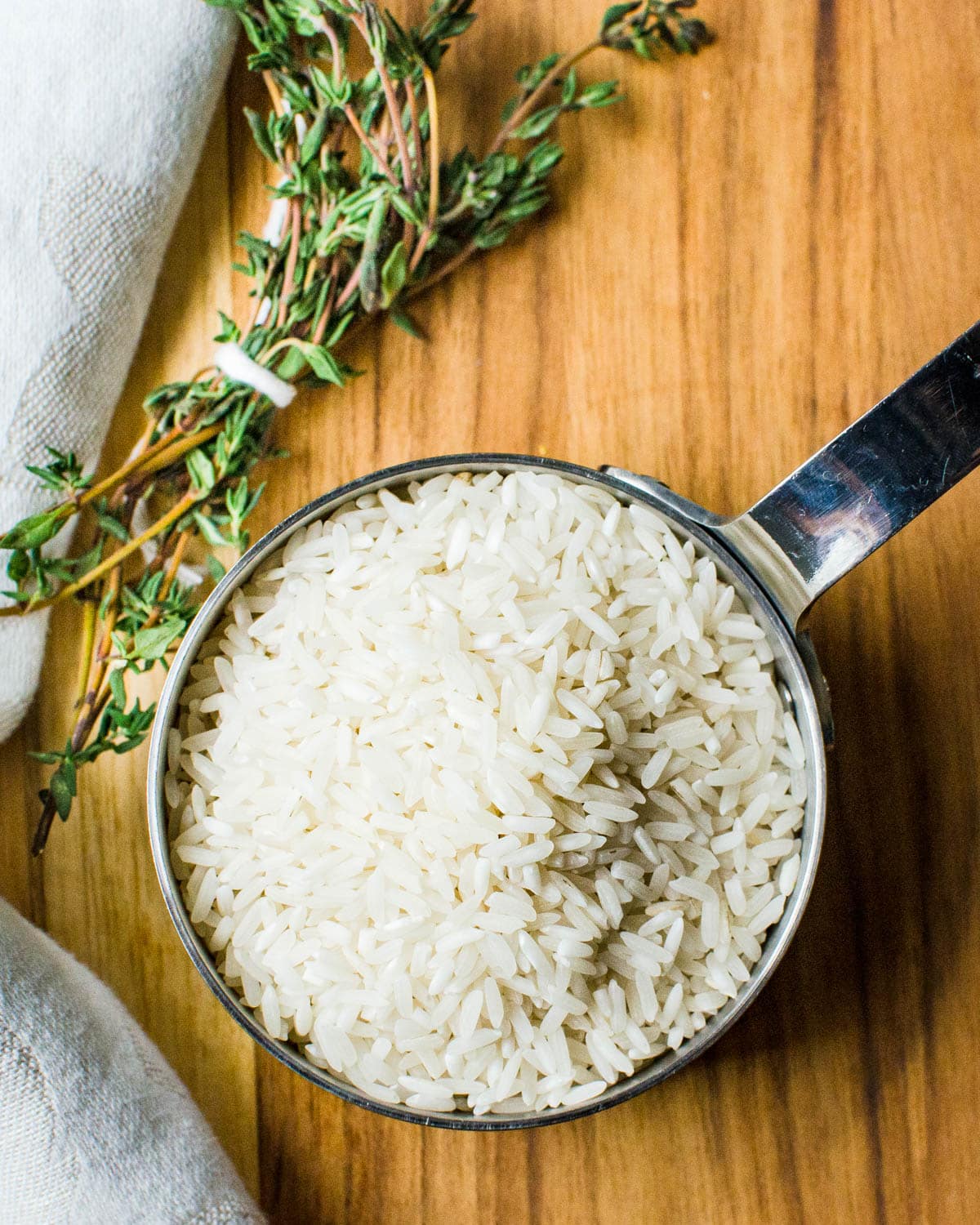 Rice and a bundle of thyme.