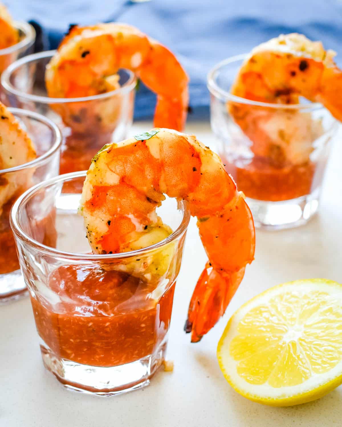 Individual shrimp cocktails with seafood cocktail sauce.