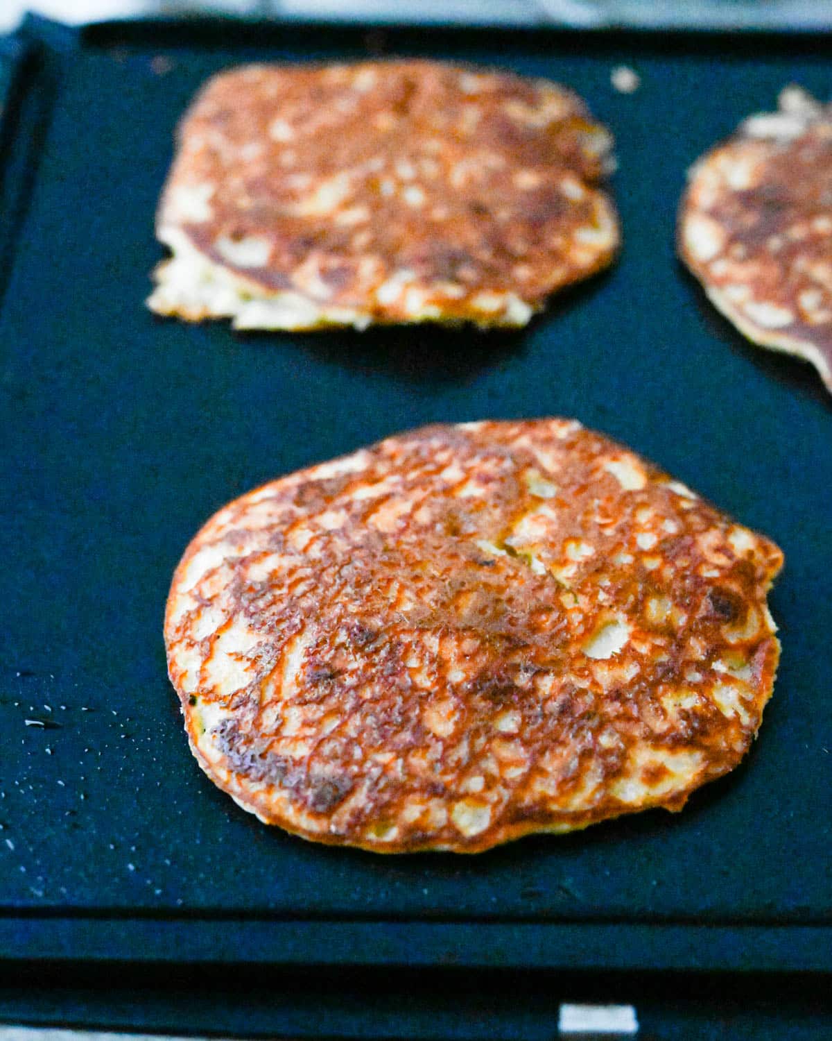 The banana pancakes after flipping.
