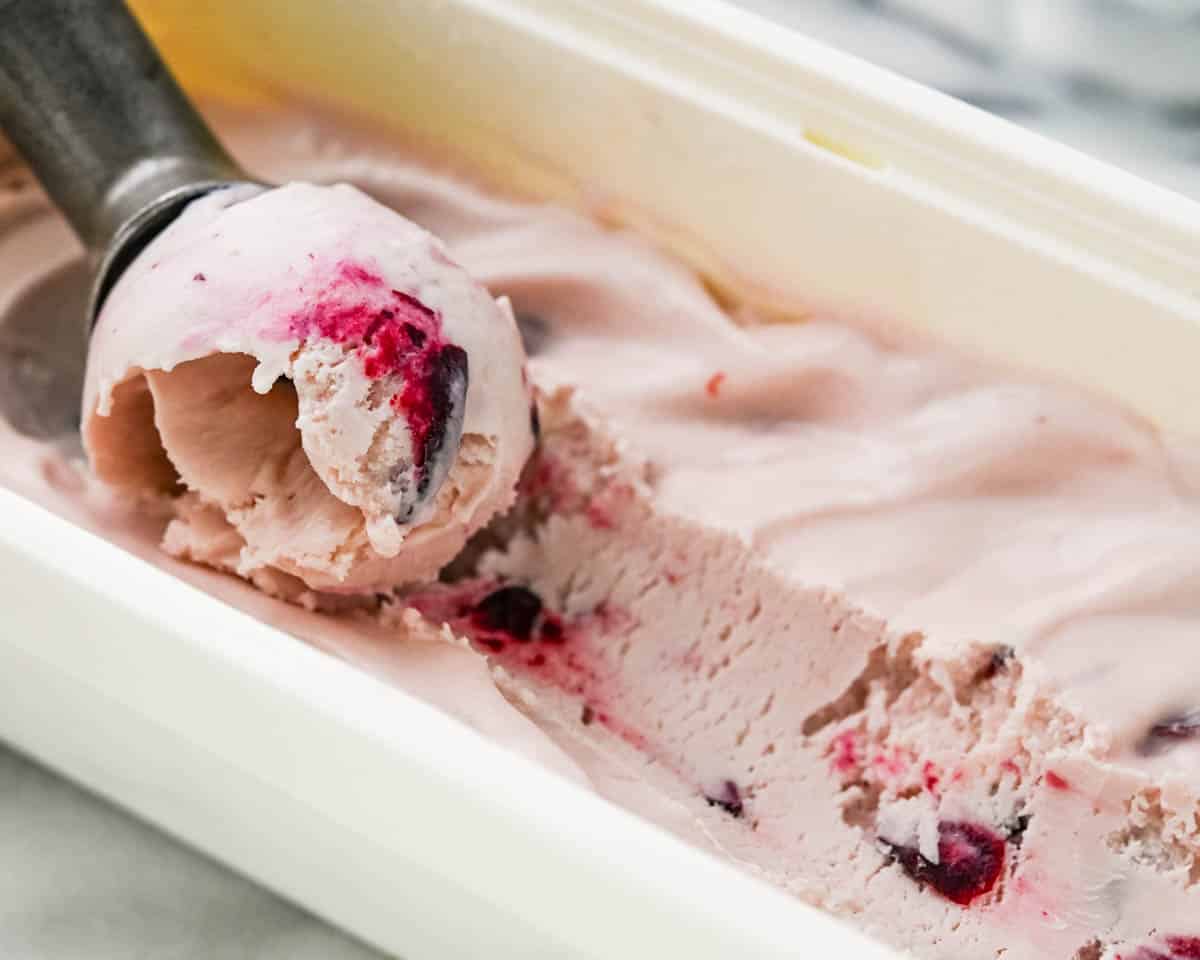 After the cherry ice cream fully freezes, it rolls and scoops smoothly.