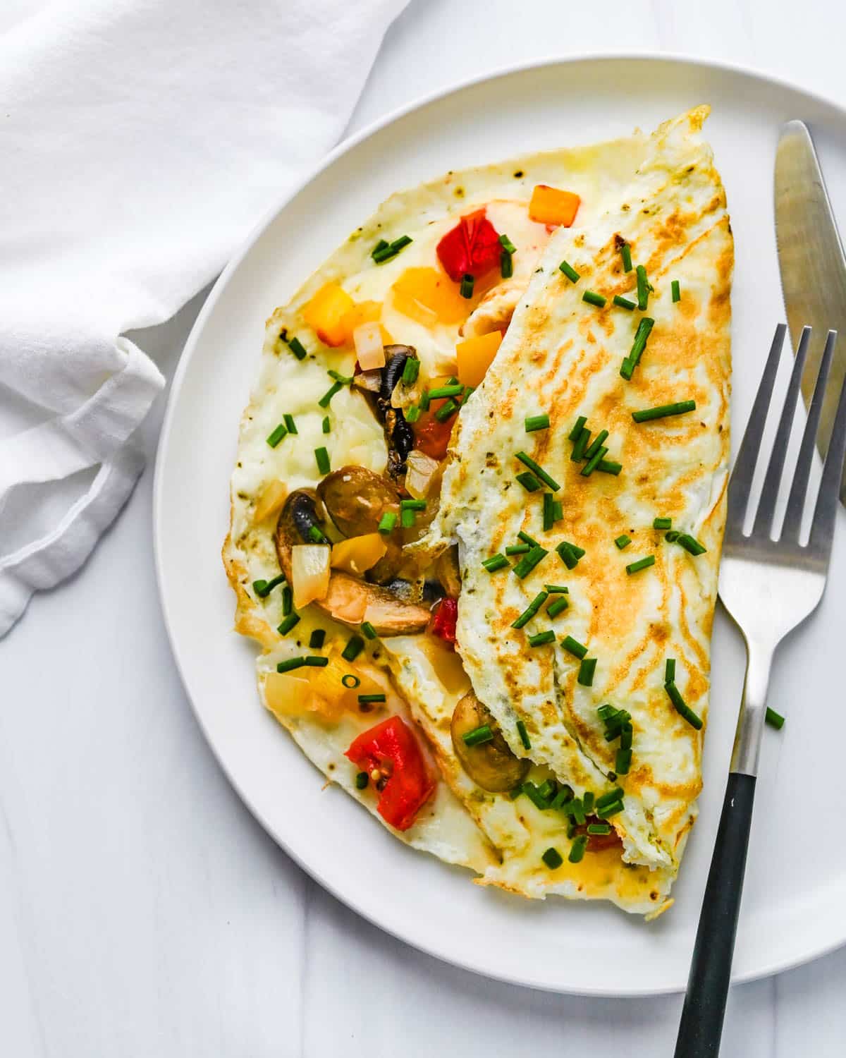https://www.garlicandzest.com/wp-content/uploads/2023/07/egg-white-omelet-17.jpg